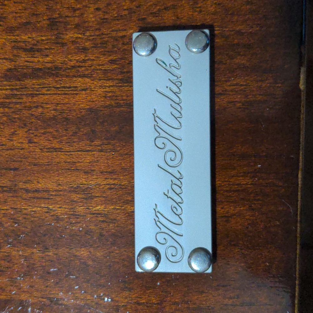 Metal mulisha plaque